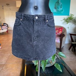 MNG mini black denim skirt